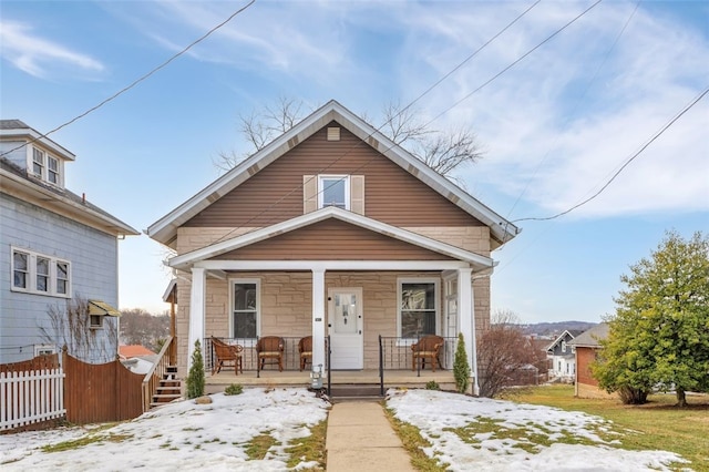 bungalow-style home with a porch