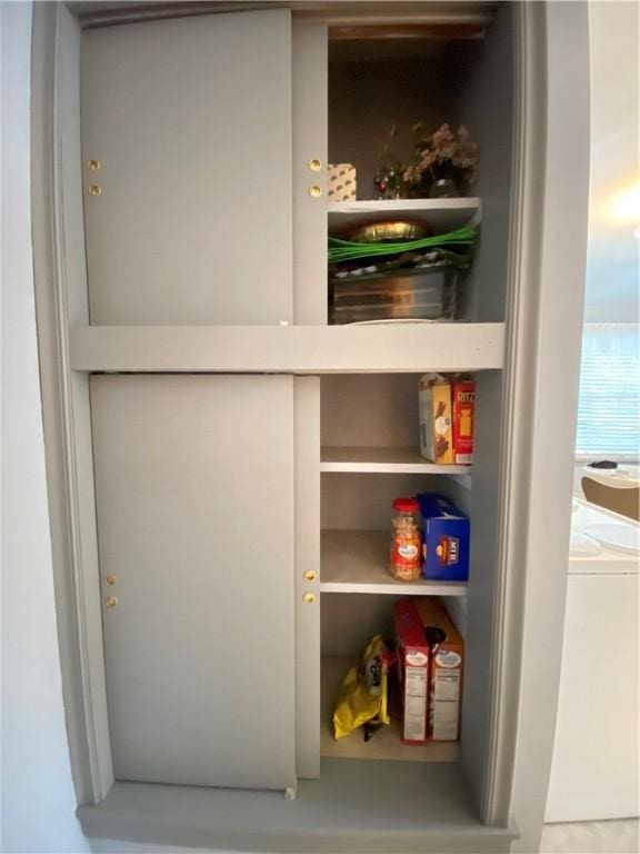 pantry with washer / clothes dryer