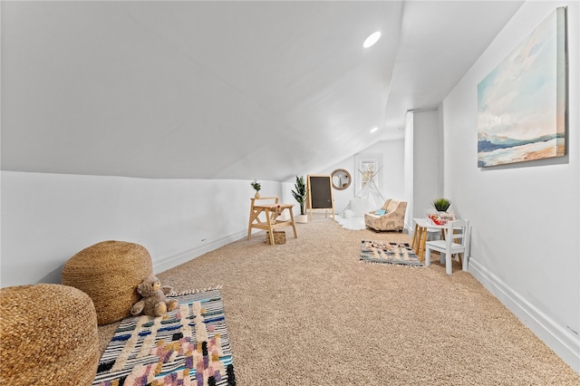 rec room with lofted ceiling and carpet floors