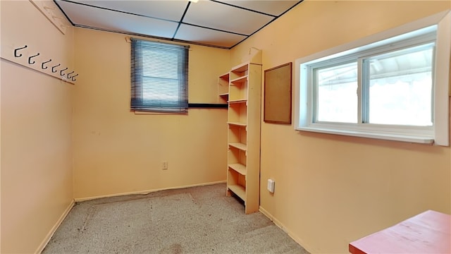 interior space featuring a paneled ceiling