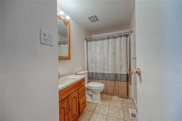 full bathroom with shower / bath combination with curtain, vanity, tile patterned floors, and toilet