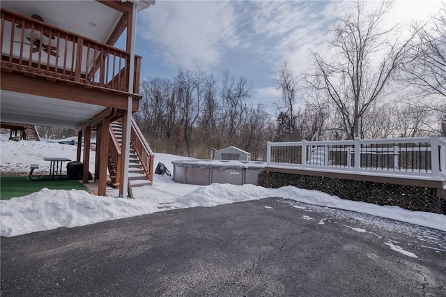 view of snow covered deck