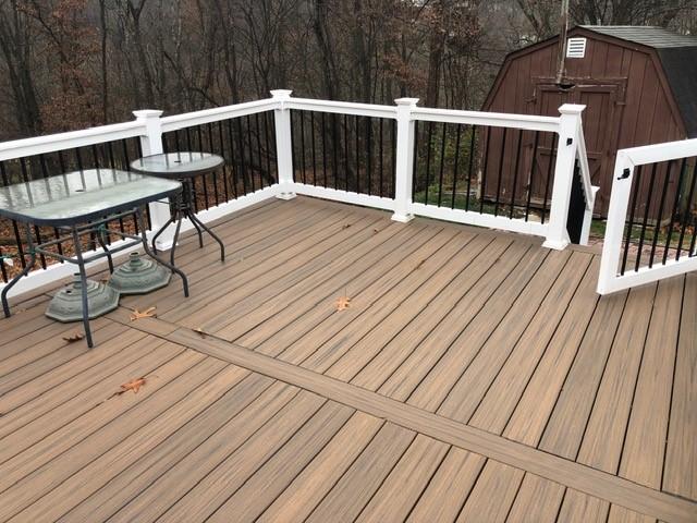 deck featuring a shed