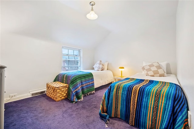 bedroom with lofted ceiling and carpet flooring