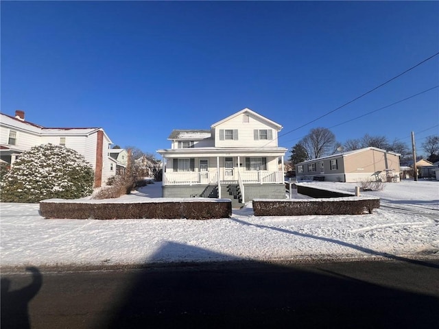 view of front of property featuring covered porch