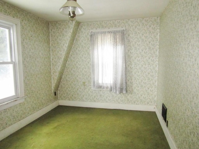 view of carpeted spare room