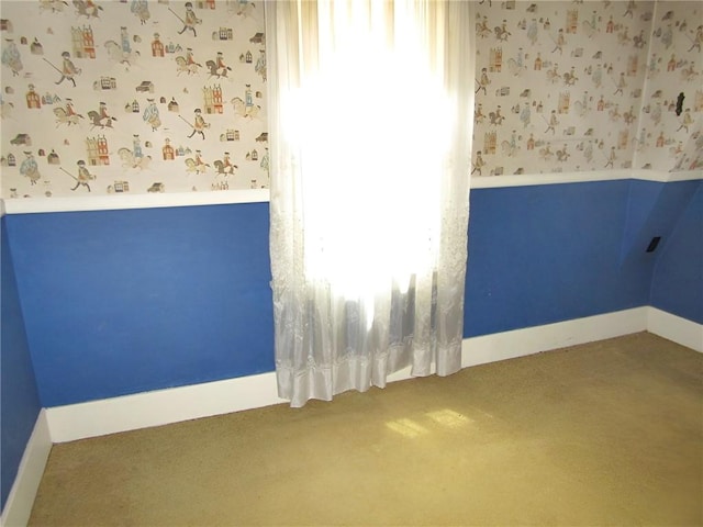 147 Carmichaels St, Dry Tav/Rices Landing, PA 15357 - spare room featuring carpet floors, plenty of natural light, wallpapered walls, and baseboards