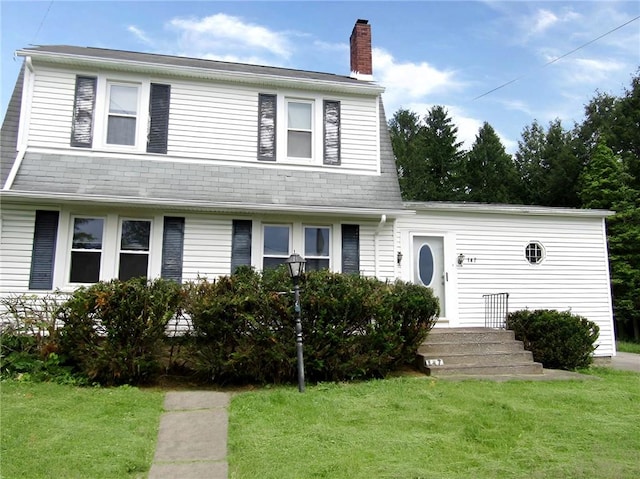147 Carmichaels St, Dry Tav/Rices Landing, PA 15357 - colonial inspired home featuring a chimney and a front yard