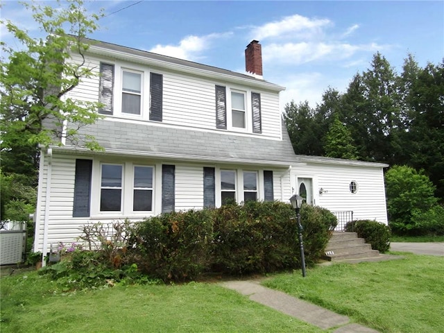 147 Carmichaels St, Dry Tav/Rices Landing, PA 15357 - view of front of home with a chimney and a front yard