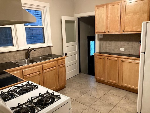 kitchen with island range hood, sink, backsplash, light tile patterned floors, and white appliances