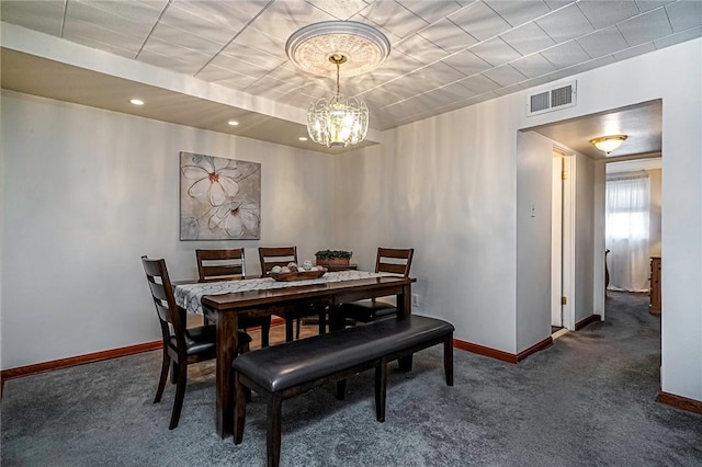 view of carpeted dining space