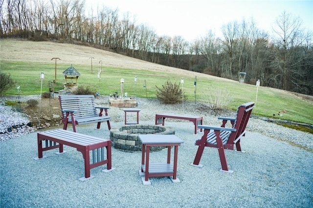 exterior space with an outdoor fire pit