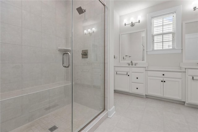 bathroom featuring vanity and walk in shower