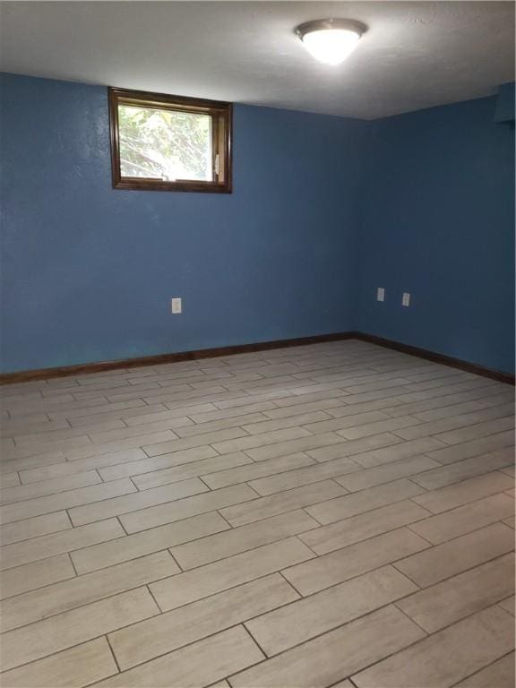 unfurnished room with light hardwood / wood-style floors