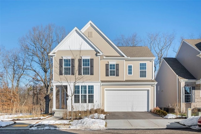 view of front of property with a garage