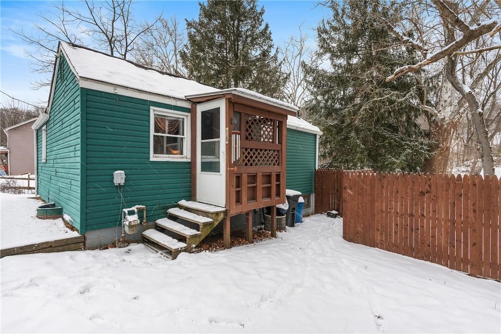 view of snow covered property