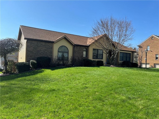 105 Lawrence Dr, Brighton Twp, PA 15009 - ranch-style house with brick siding and a front yard