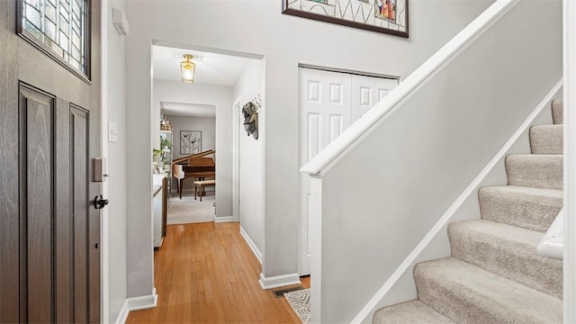 foyer entrance featuring light wood-type flooring