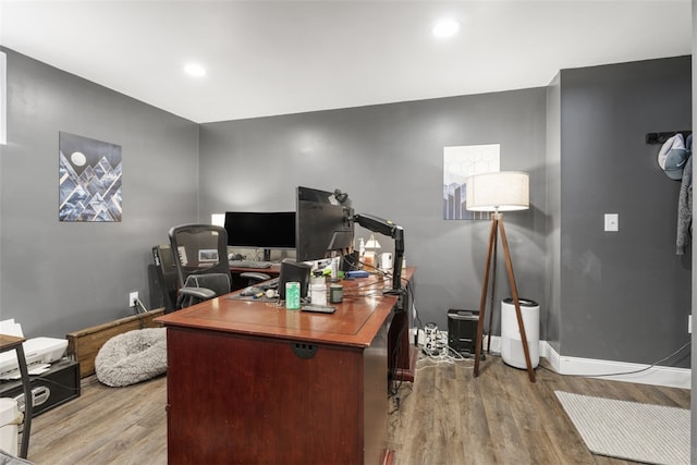 home office featuring hardwood / wood-style floors