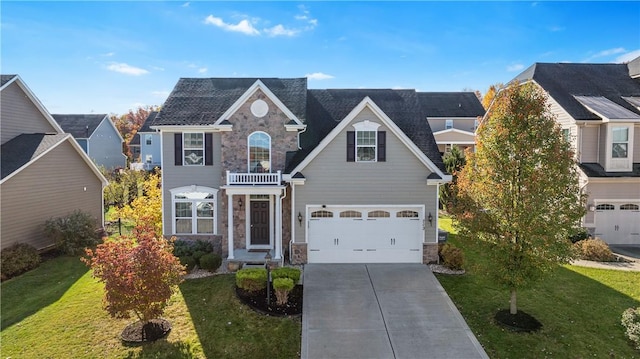 front of property with a garage and a front yard