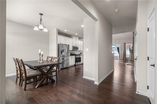 dining space with dark wood-type flooring