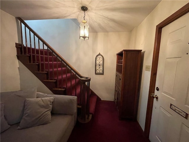 staircase with carpet floors