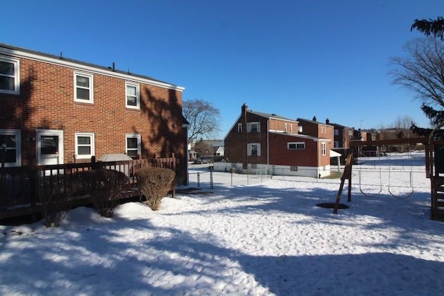 view of snow covered house