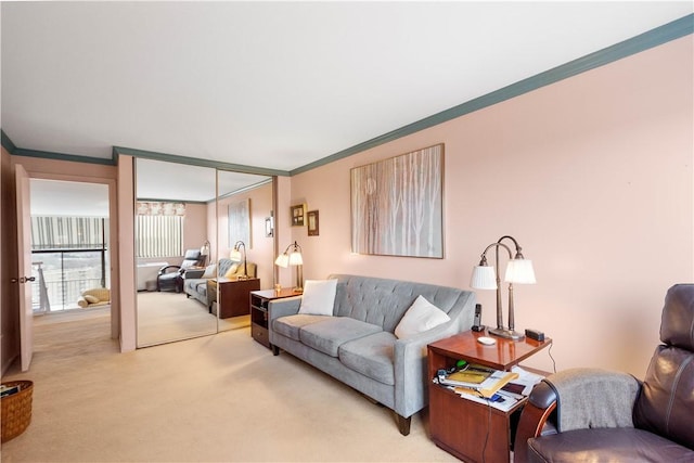 living room featuring ornamental molding and light colored carpet