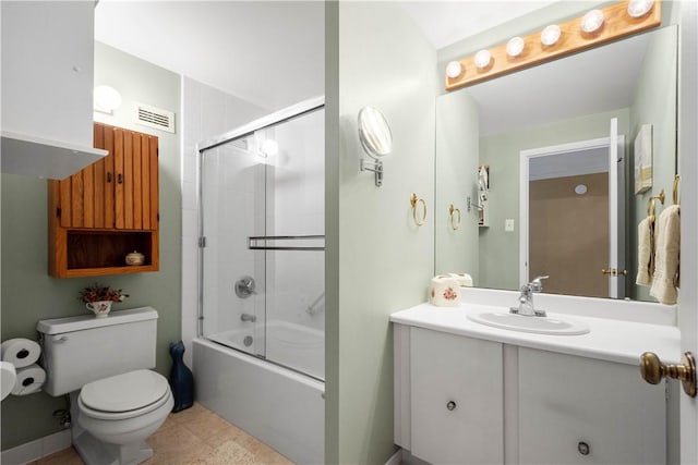 full bathroom with enclosed tub / shower combo, vanity, toilet, and tile patterned flooring