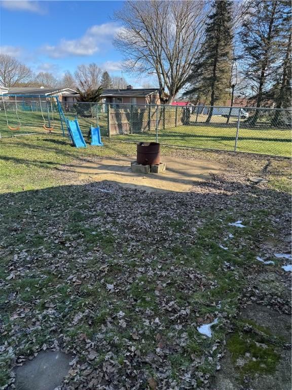 view of jungle gym featuring a yard