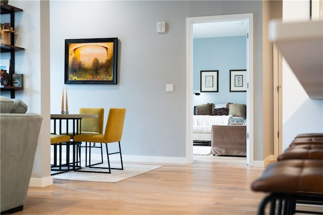 dining area with light wood-type flooring