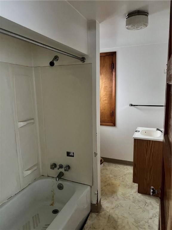 bathroom featuring vanity and tub / shower combination