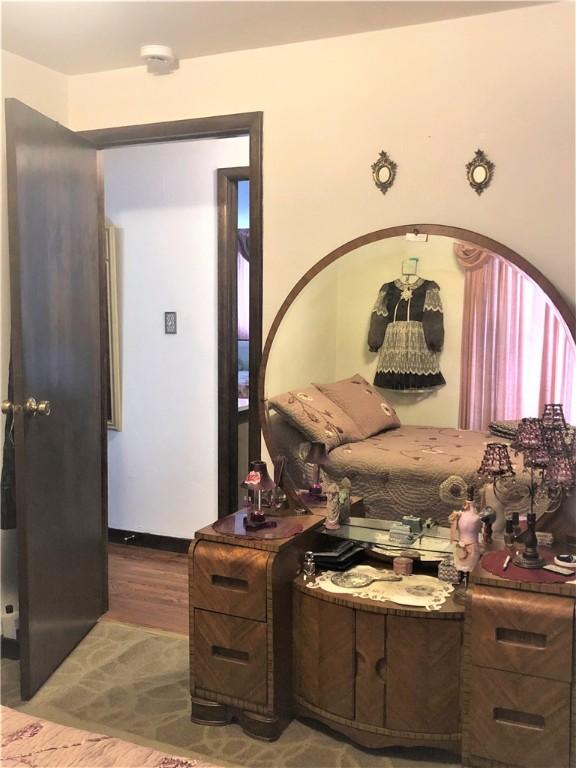 bedroom featuring hardwood / wood-style flooring