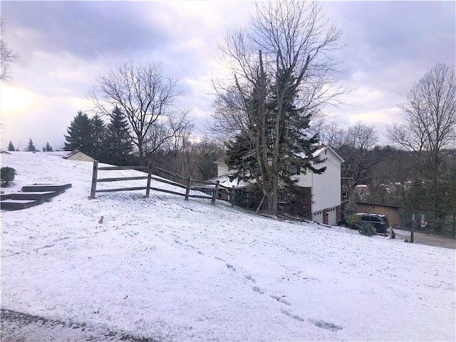 view of yard covered in snow