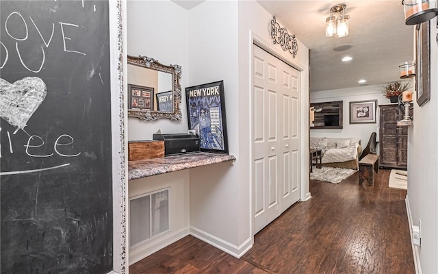 hall with dark wood-type flooring