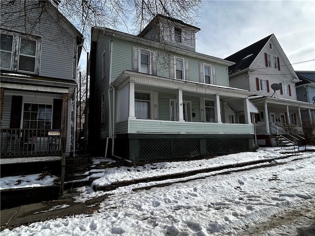 front facade featuring covered porch