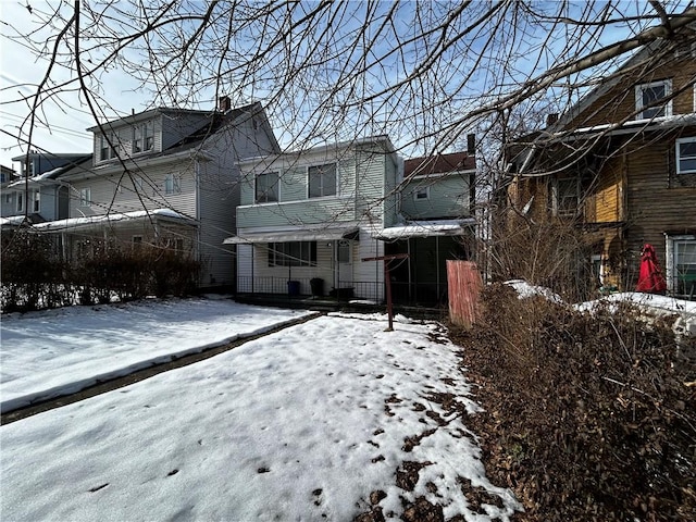 view of snow covered property