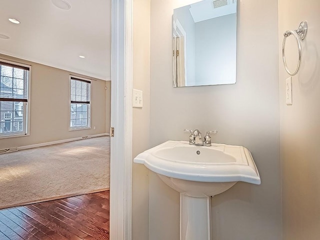 bathroom featuring hardwood / wood-style flooring