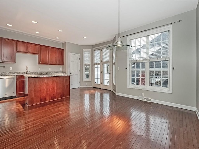 kitchen featuring decorative light fixtures, a center island, stainless steel dishwasher, dark wood-type flooring, and french doors