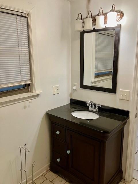 bathroom with vanity and tile patterned flooring