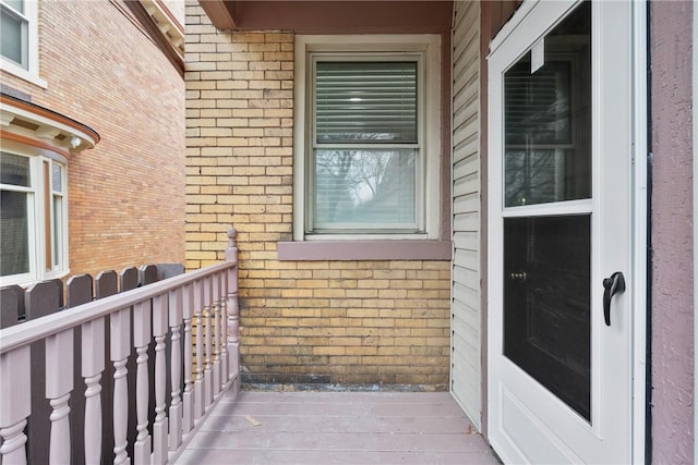 doorway to property featuring a balcony