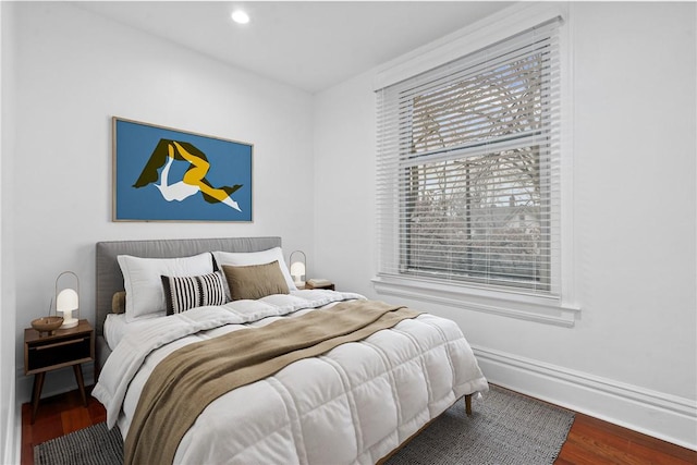 bedroom featuring hardwood / wood-style flooring