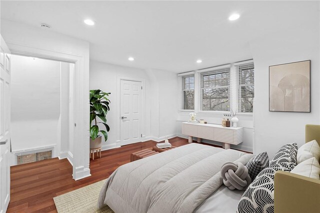 bedroom featuring dark hardwood / wood-style floors