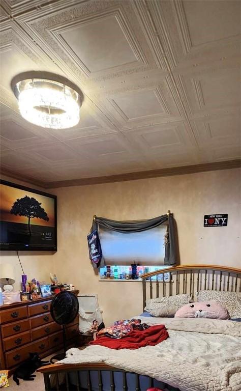 bedroom featuring ornamental molding