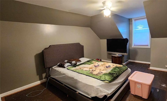 bedroom with ceiling fan and vaulted ceiling