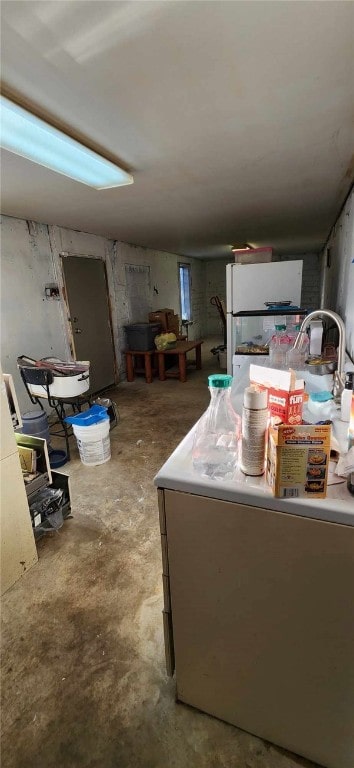 kitchen featuring concrete flooring