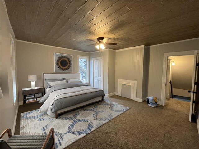 bedroom with crown molding, carpet floors, baseboards, wooden ceiling, and a ceiling fan
