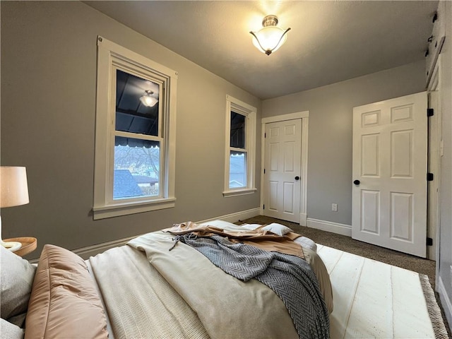 bedroom featuring baseboards