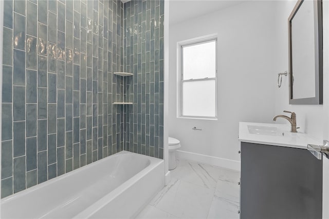 full bathroom featuring vanity, tiled shower / bath combo, and toilet