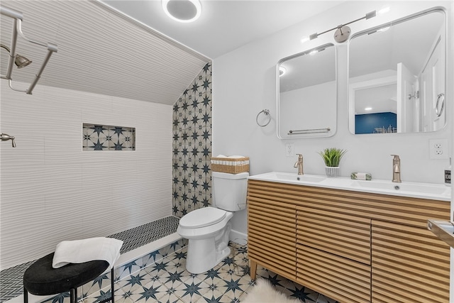 bathroom featuring walk in shower, vanity, toilet, and vaulted ceiling